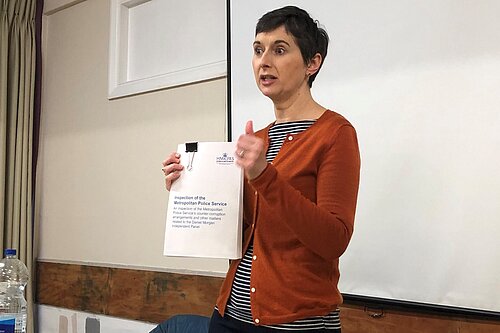 Caroline Pidgeon holing a report on the investigation of the Metropolitan Police Service