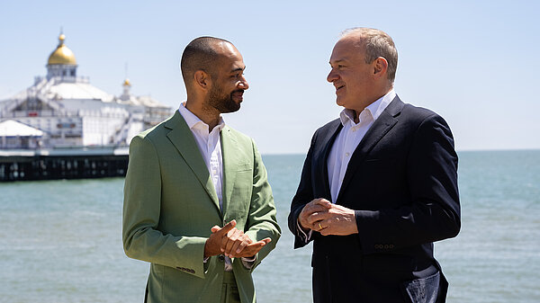Ed Davey and Josh Babarinde on Eastbourne seafront