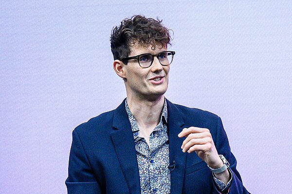 Josh Matthews speaking at the COP26 UN climate conference